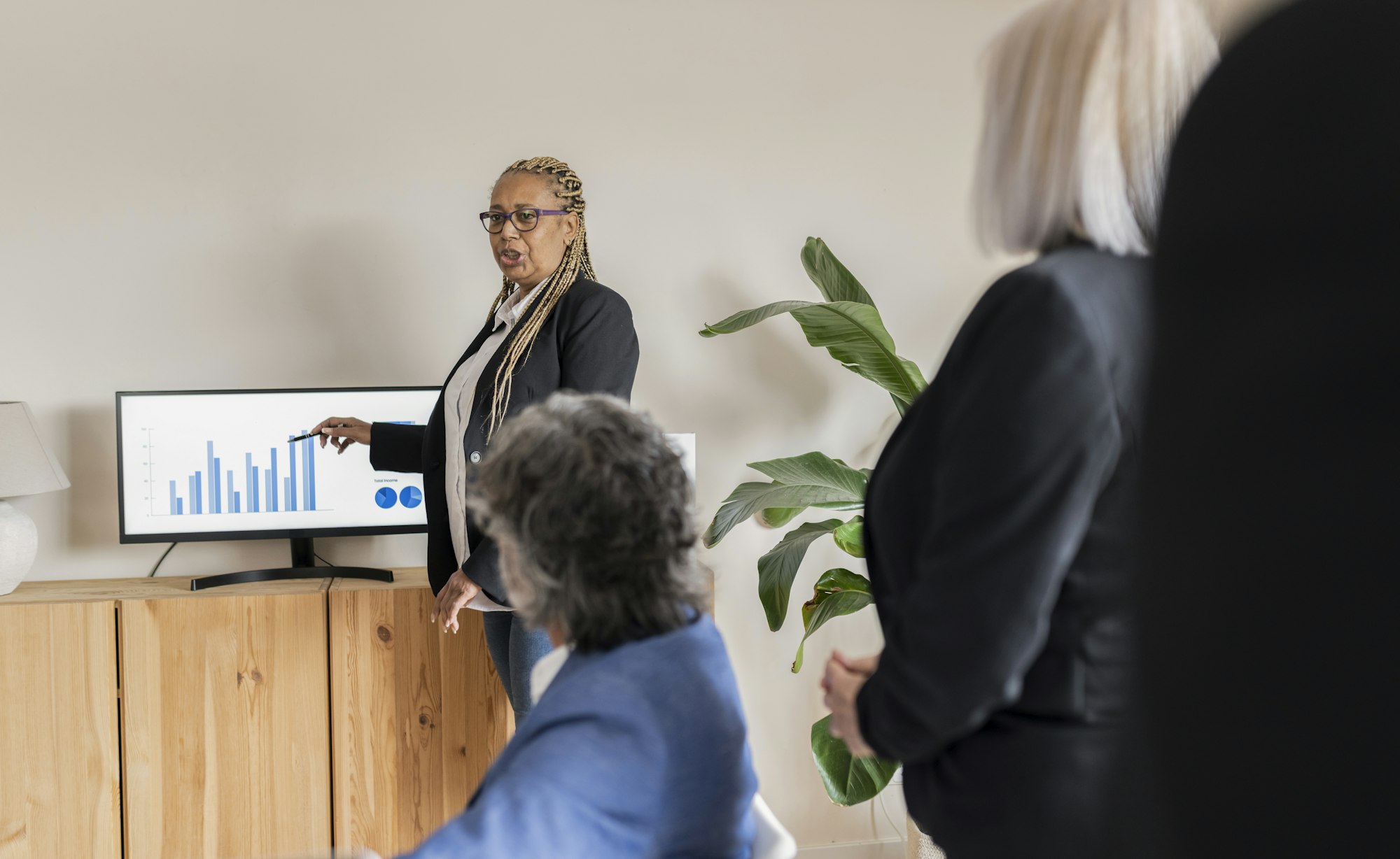 Expert Businesswoman Leading a Data Analysis Session